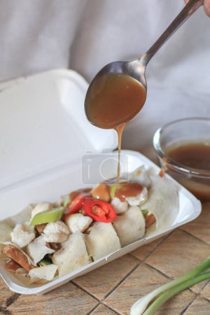 Fresh Spring rolls with crab on top and sweet sauce. Asian Food Thai style sideview. Healthy food concept.