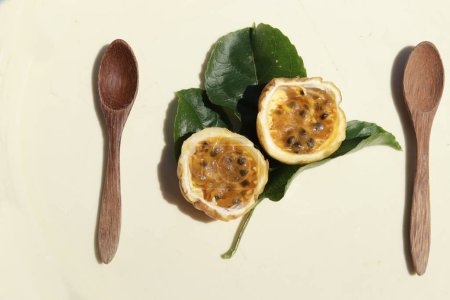 Photo for Fresh passion fruit, half cut in half on white background - Royalty Free Image