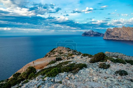 Evening hike to Puig de I'guila at the gates of the bay of Cala Sant Vicen on the Balearic island of Mallorca - Spain