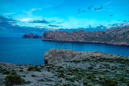 Evening hike to Puig de I'guila at the gates of the bay of Cala Sant Vicen on the Balearic island of Mallorca - Spain