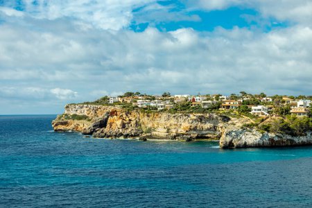 Short but beautiful hike to the Es Ponts rock gate and the coastal town of Santany in the south of the Balearic island of Mallorca - Spain