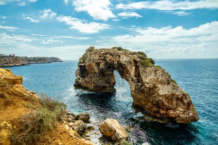 Short but beautiful hike to the Es Ponts rock gate and the coastal town of Santany in the south of the Balearic island of Mallorca - Spain