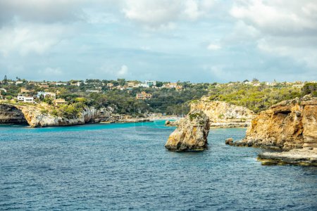 Foto de Short but beautiful hike to the Es Ponts rock gate and the coastal town of Santany in the south of the Balearic island of Mallorca - Spain - Imagen libre de derechos