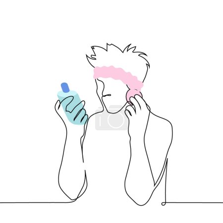 man applies a cosmetic product to his face with a sponge while reading the text on the bottle of the product - one line art vector. concept of a modern man taking care of his facial skin