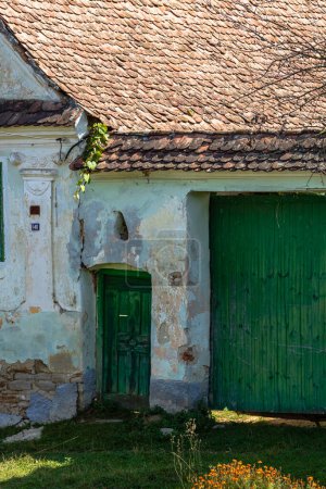Photo for View of picturesque village Viscri in Romania. Painted traditional old houses in medieval Saxon village of Viscri, Romania, 2021 - Royalty Free Image