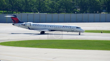 Photo for Delta Airlines Connection Bombardier CRJ-701ER lands at Chicago Midway International Airport. - Royalty Free Image