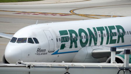 Photo for Frontier Airlines Airbus A320neo with Blanco the Polar Bear livery is parked at the gate at Chicago Midway International Airport. - Royalty Free Image