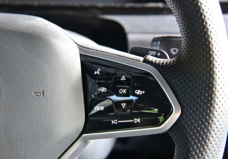 Steering wheel buttons for function control