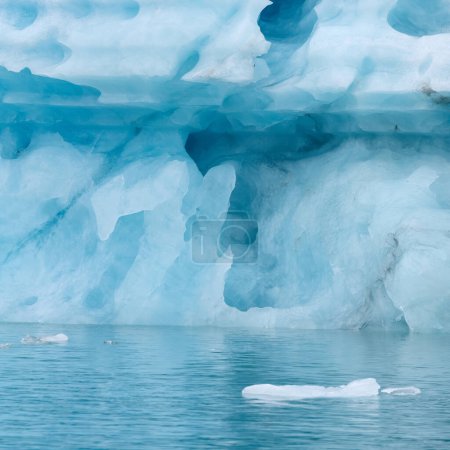 A blue iceberg in Iceland. A iceberg flowing into the Jokulsarlon lagoon, detached from the glacier's front.