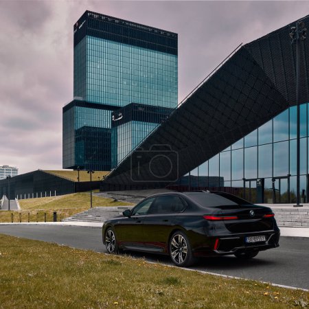 Photo for BMW 7 Series, G70, a modern premium limousine. On a background of modern buildings. On sale from 2023. Poland, Katowice 03.05.2023 - Royalty Free Image