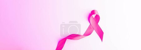 Photo for Cancer day. Health care symbol pink ribbon on white background. Breast cancer woman support concept with copy space - Royalty Free Image