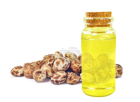 Photo for Tiger nut oil in bottle isolated on white background - Royalty Free Image