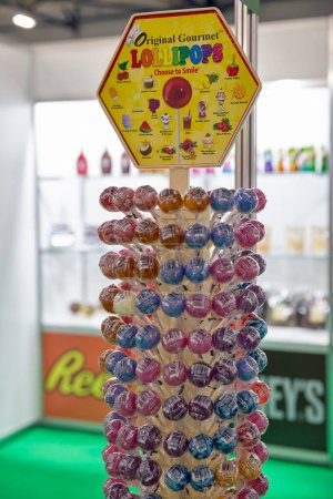 Photo for Kyiv, Ukraine - November 04, 2021: Turkish TM Original Gourmet Lollipops confectionery products booth at Wine and Spirits Exhibition, main event for wine and spirits market in Eastern Europe. - Royalty Free Image