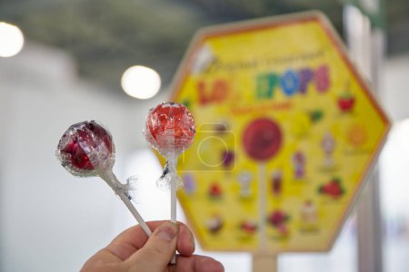 Photo for Kyiv, Ukraine - November 04, 2021: Turkish TM Original Gourmet Lollipops confectionery products booth at Wine and Spirits Exhibition, main event for wine and spirits market in Eastern Europe. - Royalty Free Image