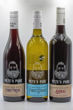Photo for Kyiv, Ukraine - September 03, 2022: Studio shoot of Petes Pure Pinot Noir, Shiraz and Pinot Grigio Australian dry wine bottles closeup against white background. - Royalty Free Image