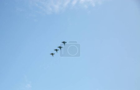 Photo for Kyiv, Ukraine - August 22, 2021: Group of flying military aircrafts SU-27 during parade dedicated to Independence Day of Ukraine. - Royalty Free Image