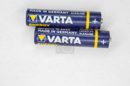 Photo for Kyiv, Ukraine - July10, 2022: Used Varta alkaline batteries for portable devices closeup on white. Varta AG is a German company manufacturing batteries for global automotive and consumer markets. - Royalty Free Image