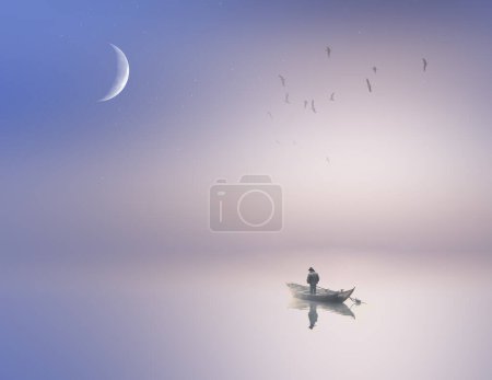 Foto de Lonely fisherman on the calm and misty lake - Imagen libre de derechos