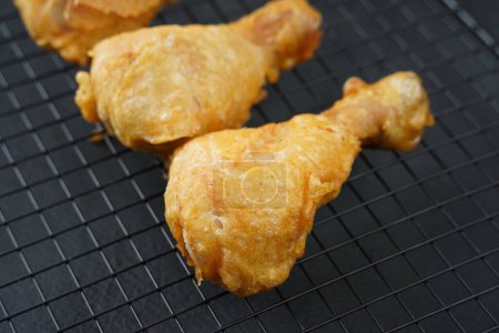 Palitos de pollo frito en masa