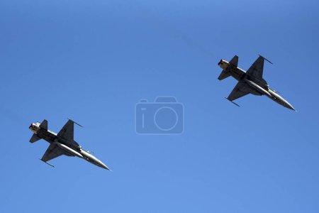 Photo for Rio de Janeiro (RJ), 07.16.2023 - F-5M fighter jets flying over the Maracan ending the 150th anniversary party of Santos Dumont's birth. Match between Fluminense x Flamengo for the Brazilian Championship at Maracan. - Royalty Free Image
