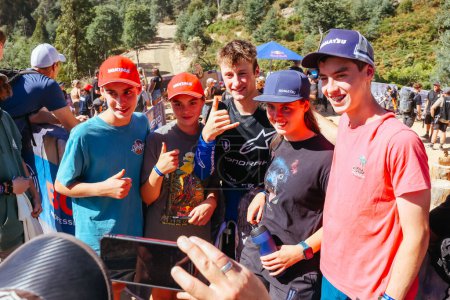 Photo for MAYDENA, AUSTRALIA - FEBRUARY 24: Ronan Dunne of Ireland with fans after winning Red Bull Hardline Tasmania on February 24, 2024 in Maydena, Australia. - Royalty Free Image