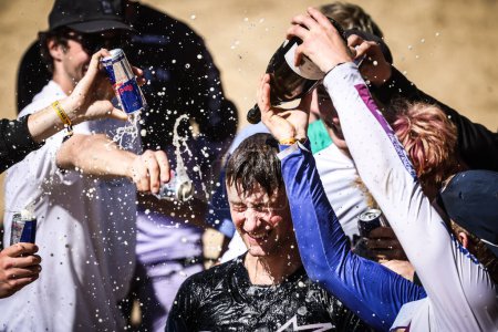 Photo for MAYDENA, AUSTRALIA - FEBRUARY 24: Ronan Dunne of Ireland celebrates his win being covered in Red Bull drink at Red Bull Hardline Tasmania on February 24, 2024 in Maydena, Australia. - Royalty Free Image