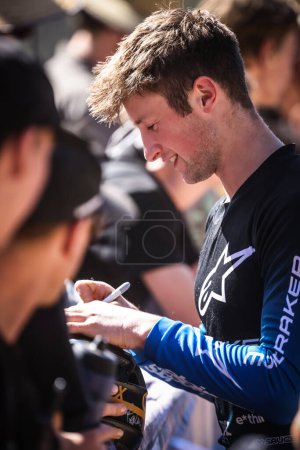 Photo for MAYDENA, AUSTRALIA - FEBRUARY 24: Ronan Dunne of Ireland with fans after winning Red Bull Hardline Tasmania on February 24, 2024 in Maydena, Australia. - Royalty Free Image