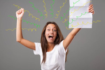 Young woman elated and happy over the written contents of the paper she holds. Her joy seems to stem from excellent news contained in a letter. She cheers with raised arms and laughter. Chaotic graphi
