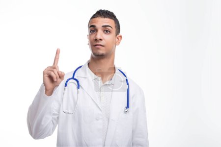 The doctors single raised finger suggests a moment of clarity or a vital health recommendation 