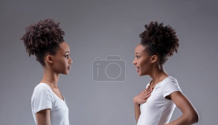 Introspective conflict captured: black woman scorns her reflection's shock, a self-contemplative scrutiny in play