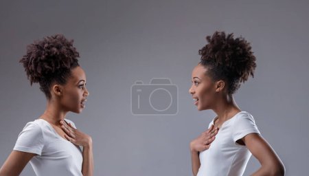 Surprising discovery of common ground shown in the mirrored expressions of two black women