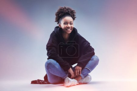 Comfortable in her skin, young woman enjoys a relaxed moment