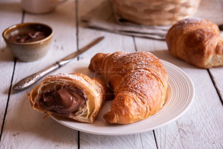 Photo for Baked sweet croissants with chocolate, close up - Royalty Free Image