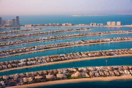 Photo for Palm Jumeirah island in Dubai on sunset, modern architecture, beaches and villas - Royalty Free Image