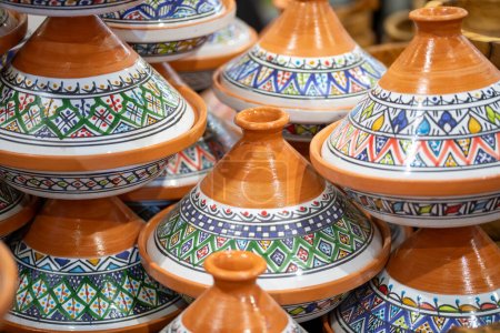Photo for Many Moroccan ceramic taajine beautifully painted for cooking on a stack - Royalty Free Image