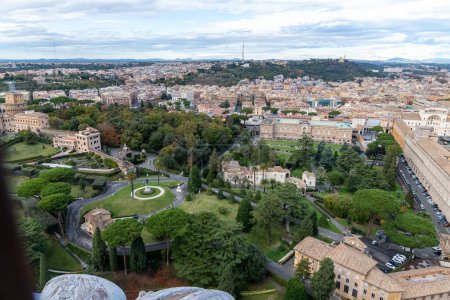 Photo for Roma, Latium - Italy - 11-26-2022: Overlooking the lush Vatican Gardens, this view captures the expansive urban landscape of Rome - Royalty Free Image