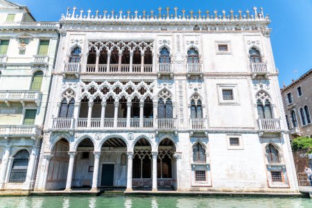 Photo for Venice, Veneto - Italy - 06-10-2021: Venice's Ca' d'Oro palace, a stunning example of Venetian Gothic architecture on the Grand Canal - Royalty Free Image