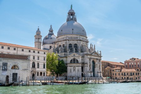 Venice, Veneto - Italy - 06-10-2021: Iconic Santa Maria della Salute Basilica by the Venetian canal