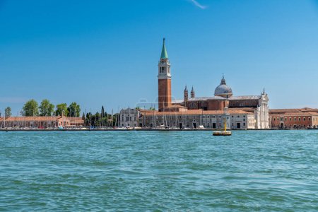 Venice, Veneto - Italy - 06-10-2021: San Giorgio Maggiore church rises against the sky on its namesake island in Venice