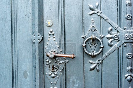 Photo for Loebau, Saxony - Germany - 04-17-2021: Close-up of a historic ornate wooden door with intricate metalwork, symbolizing Lbau's rich architectural heritage - Royalty Free Image