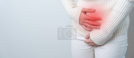Photo for Woman having Stomach pain. Ovarian and Cervical cancer, Cervix disorder, Endometriosis, Hysterectomy, Uterine fibroids, Reproductive system, menstruation, diarrhea and Pregnancy concept - Royalty Free Image