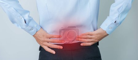 Photo for Man having back pain. Urinary system and Stones, Cancer, world kidney day, Chronic kidney stomach, liver pain and pancreas concept - Royalty Free Image