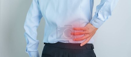 Photo for Man having back pain. Urinary system and Stones, Cancer, world kidney day, Chronic kidney stomach, liver pain and pancreas concept - Royalty Free Image