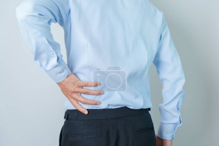 Téléchargez les photos : Man having back pain. Urinary system and Stones, Cancer, world kidney day, Chronic kidney stomach, liver pain and pancreas concept - en image libre de droit