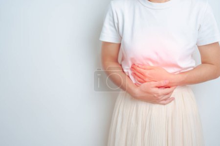 Photo for Woman having abdomen pain. Stomach, Ovarian and Cervical cancer, Cervix disorder, Endometriosis, Hysterectomy, Uterine fibroids, Reproductive, menstruation, diarrhea, digestive system and Pregnancy - Royalty Free Image