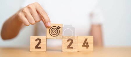 Photo for 2024 year block with dartboard icon. Goal, Target, Resolution, strategy, plan, Action, mission, motivation, and New Year start concepts - Royalty Free Image