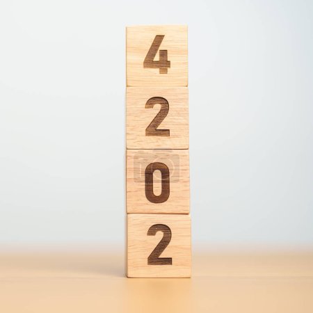 Photo for 2024 year block on table. goal, Resolution, strategy, plan, start, budget, mission, action, motivation and New Year concepts - Royalty Free Image