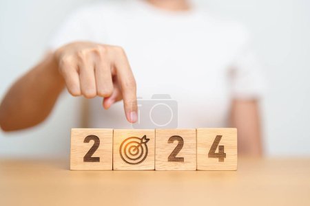 Photo for 2024 year block with dartboard icon. Goal, Target, Resolution, strategy, plan, Action, mission, motivation, and New Year start concepts - Royalty Free Image