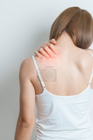 Photo for Woman having Shoulder and Neck pain at home. Muscle painful due to Myofascial pain syndrome and Fibromyalgia, rheumatism, Scapular pain, Cervical Spine. ergonomic concept - Royalty Free Image