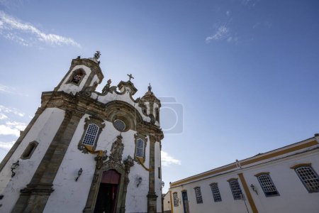 Photo for Facade of hirtoric baroque Church of Our Lady Of Carmel (Igreja Nossa Senhora do Carmo), located in Sao Joao Del Rey, Minas Gerais, Brazil. Under blue sky - Royalty Free Image